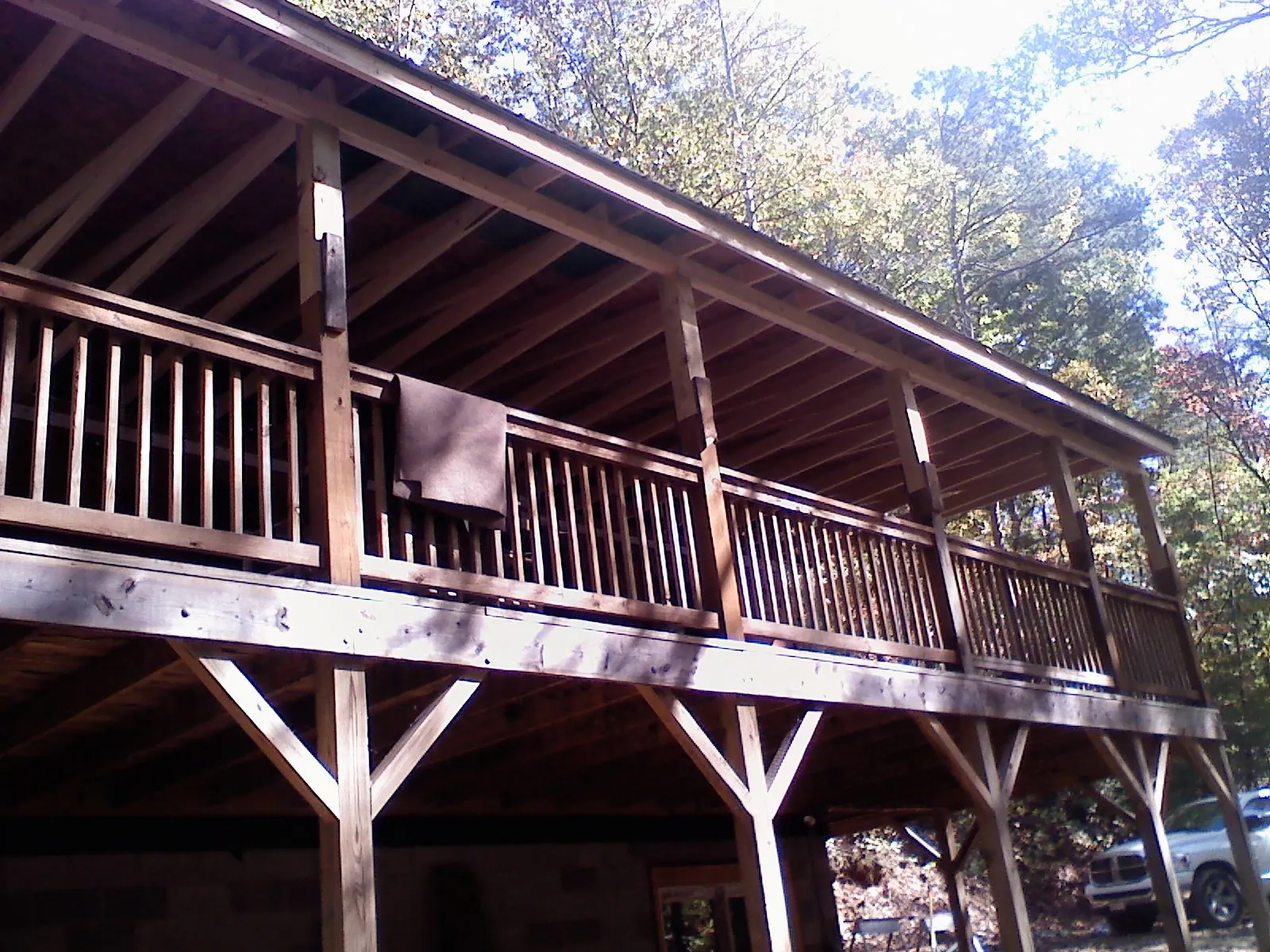 Timber framing under a new elevated porch and deck — Roof Leak Repair in Powers by Roofing Brothers